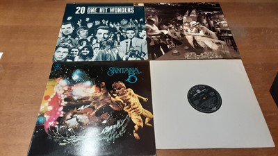 Lot 2315 - Two vintage cases of LP records including Rolling Stones, Beatles, John Lennon, Led Zeppelin, Jefferson Airplane, Zappa, Buddy Holly and Spencer Davis, most discs in very good or excellent conditio...