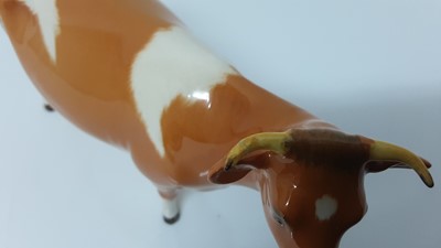 Lot 93 - Beswick Jersey Cow - CH Newton Tinkle, model no. 1345, designed by Arthur Gredington, 10.8cm high, together with Guernsey Cow, and Bull plus a Limousin calf(4)