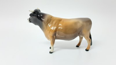 Lot 93 - Beswick Jersey Cow - CH Newton Tinkle, model no. 1345, designed by Arthur Gredington, 10.8cm high, together with Guernsey Cow, and Bull plus a Limousin calf(4)