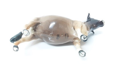 Lot 93 - Beswick Jersey Cow - CH Newton Tinkle, model no. 1345, designed by Arthur Gredington, 10.8cm high, together with Guernsey Cow, and Bull plus a Limousin calf(4)