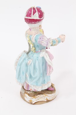 Lot 55 - Meissen figure of a girl with a doll