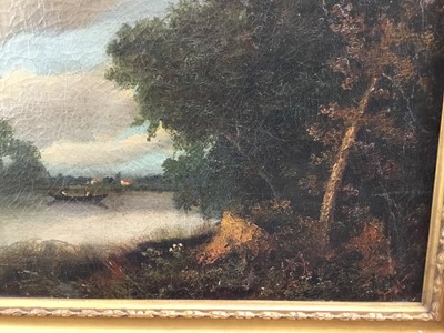 Lot 10 - oil on canvas landscape with fishermen in boat on a lake and village beyond, 52cm x 42cm in gilt frame