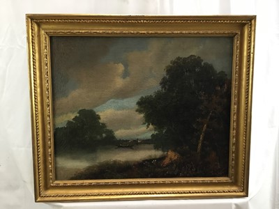 Lot 10 - oil on canvas landscape with fishermen in boat on a lake and village beyond, 52cm x 42cm in gilt frame