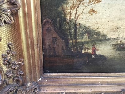 Lot 96 - 19th century English School oil on panel - village beside a river, in gilt frame