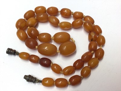 Lot 55 - Amber bead necklace, green hard stone necklace and other vintage beads