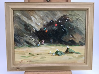 Lot 29 - Deborah Jones (d. 2012 ) oil on board - Children playing on a beach below cliffs, signed, 29cm x 39cm