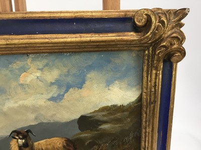 Lot 32 - Manner of John W. Morris oil on board - sheep in a mountainous river landscape, 24cm x 30cm