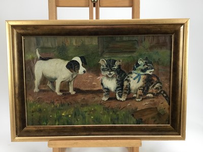 Lot 35 - English school oil on canvas - a puppy and kittens, signed and dated 'May Egdell, 1912'