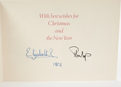 Lot 47 - H.M.Queen Elizabeth II and H.R.H.The Duke of Edinburgh, two signed 1982 and 1983 Christmas cards with twin gilt Royal ciphers to interiors and colour photographs of the Royal Family to fronts (2)