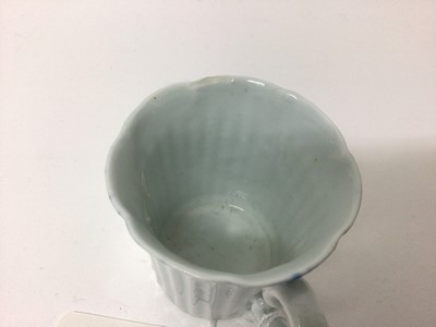 Lot 53 - Worcester blue and white moulded tea wares, circa 1780, including a tea bowl and saucer with floral moulding, and a cup, tea bowl and saucer (5)