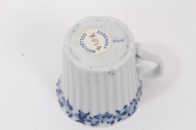 Lot 53 - Worcester blue and white moulded tea wares, circa 1780, including a tea bowl and saucer with floral moulding, and a cup, tea bowl and saucer (5)