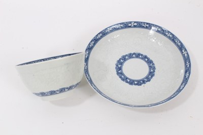 Lot 53 - Worcester blue and white moulded tea wares, circa 1780, including a tea bowl and saucer with floral moulding, and a cup, tea bowl and saucer (5)