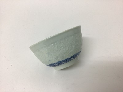 Lot 53 - Worcester blue and white moulded tea wares, circa 1780, including a tea bowl and saucer with floral moulding, and a cup, tea bowl and saucer (5)