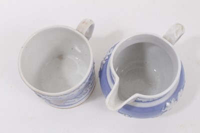 Lot 27 - A New Hall mug, with applied decoration, on a lilac ground, and dated 1819, and a similar jug