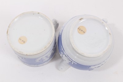 Lot 27 - A New Hall mug, with applied decoration, on a lilac ground, and dated 1819, and a similar jug