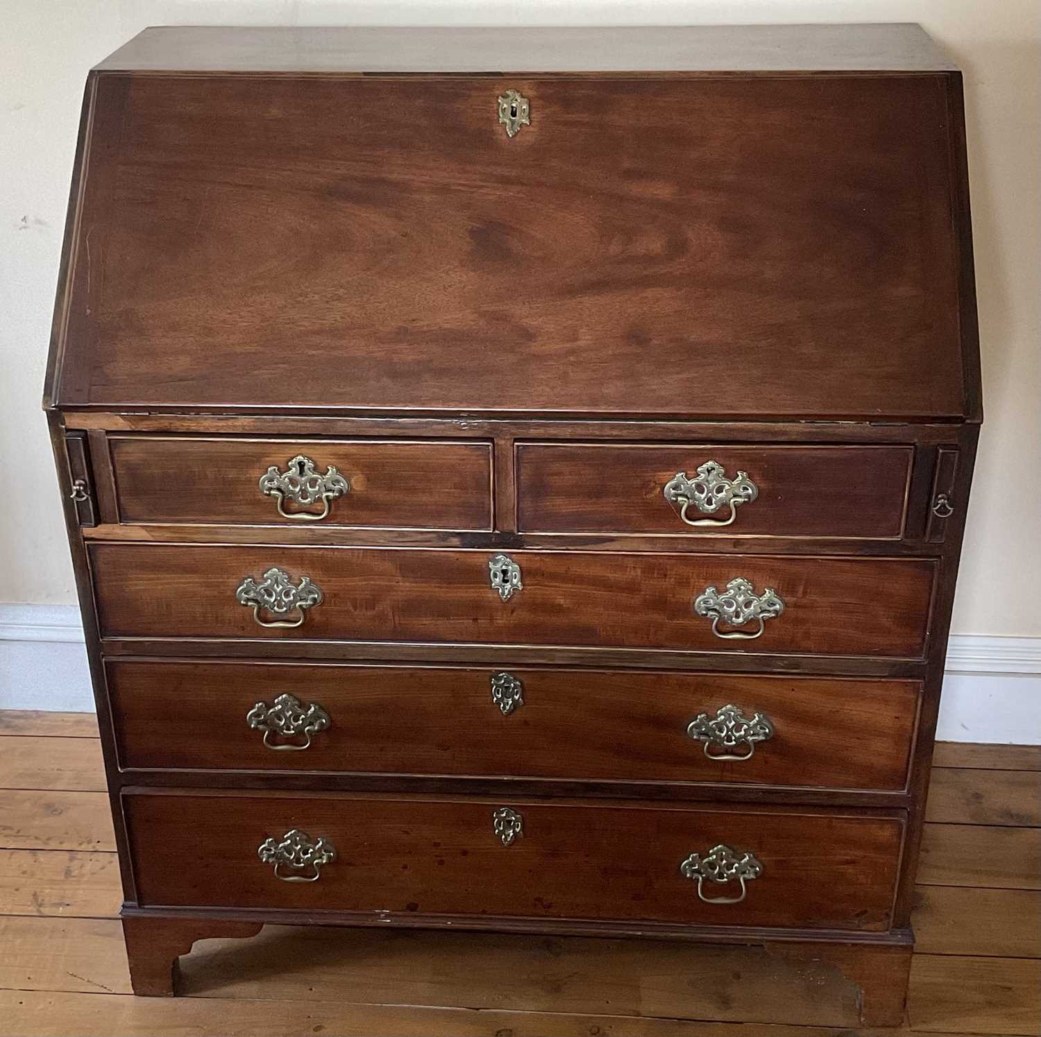 Lot 18 - George III mahogany bureau.