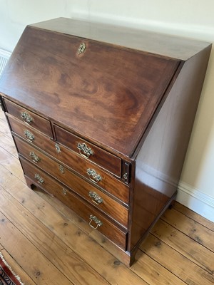 Lot 18 - George III mahogany bureau.