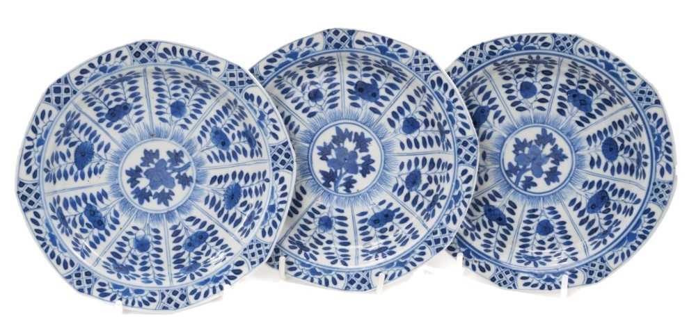 Lot 38 - Three Chinese Kangxi blue and white saucer dishes