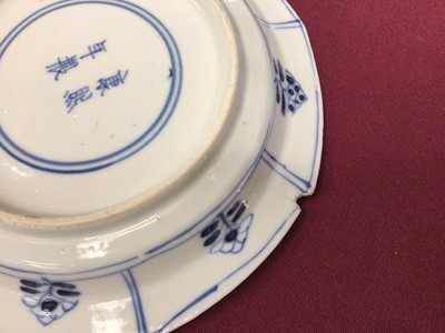 Lot 38 - Three Chinese Kangxi blue and white saucer dishes