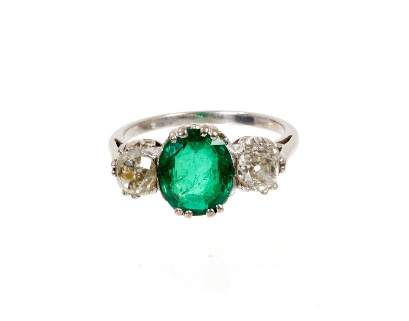 Lot 625 - Emerald and diamond three stone ring
