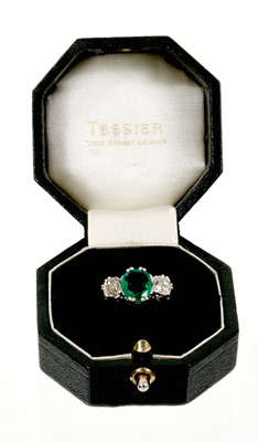 Lot 625 - Emerald and diamond three stone ring