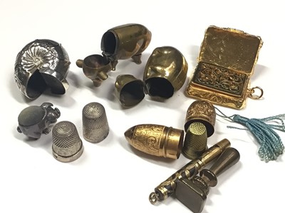Lot 13 - Miniature silver pig pin cushion, 25mm, brass pig and brass mouse vestas, white metal shell box, two silver thimbles, gilt metal thimble case, gilt metal vinaigrette and other items
