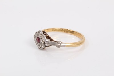 Lot 40 - Ruby and diamond cluster ring with a daisy head cluster with central ruby and single cut diamonds in platinum setting on 18ct yellow gold shank.