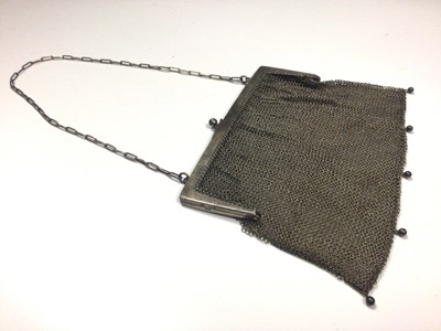 Lot 25 - Silver mesh purse, two other silver plated mesh purses and a vanity jar