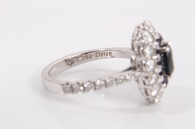 Lot 140 - 18ct white gold sapphire and diamond cluster ring