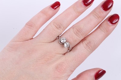 Lot 118 - Diamond two stone cross over ring