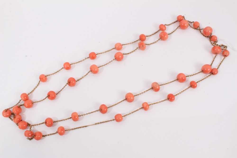 Lot 124 - Antique 9ct gold and coral long necklace