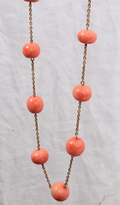 Lot 124 - Antique 9ct gold and coral long necklace