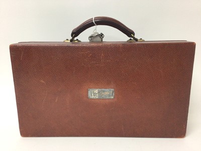 Lot 128 - Late Victorian silver backed dressing table set in fitted brown leather travel case
