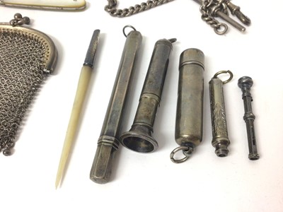 Lot 132 - Two white metal mesh purses, silver sovereign case on silver watch chain, silver propelling pencils, silver cheroot holder, silver and mother of pearl fruit knife, miniature silver mirror and other...