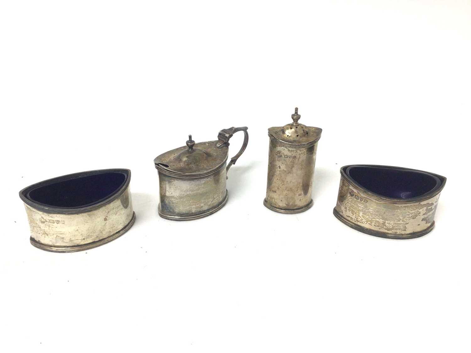 Lot 135 - 1920s silver four piece cruet set