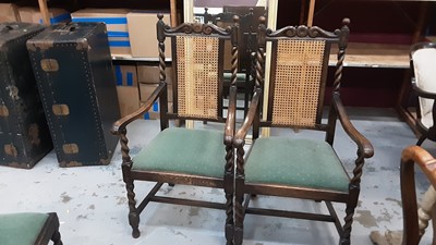 Lot 1037 - 1930s Jacobean Revival carved oak sideboard, together with a set of six 1930s oak dining chairs and draw leaf table
