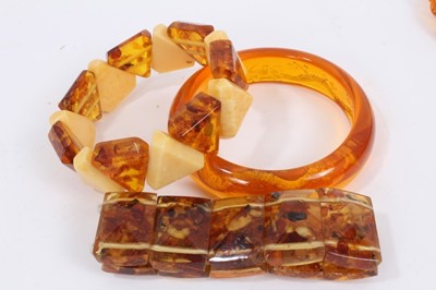 Lot 856 - Amber bead necklace, one other necklace, vintage simulated cherry amber faceted bead necklace and three bracelets