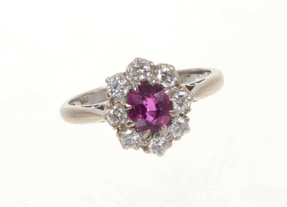 Lot 431 - Ruby and diamond cluster ring