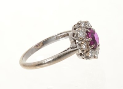 Lot 431 - Ruby and diamond cluster ring