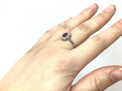 Lot 431 - Ruby and diamond cluster ring