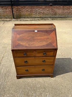 Lot 72 - Edwardian inlaid mahogany bureau with fitted interior above two short and two long drawers