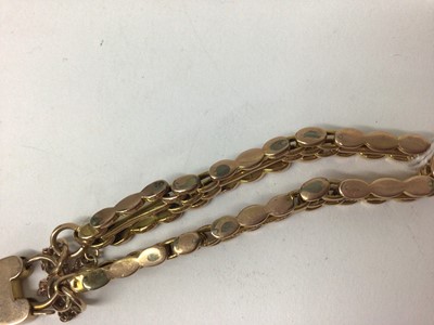 Lot 871 - 9ct rose gold gate bracelet with padlock clasp, within a small carved wood trinket box