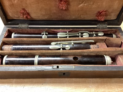 Lot 2217 - 19th century hardwood flute in rosewood case
