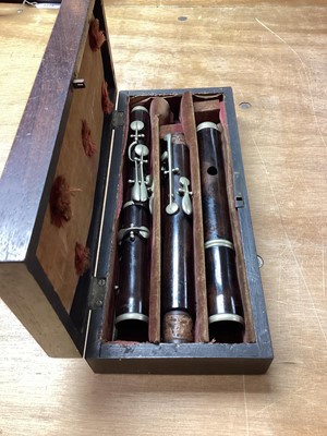 Lot 2217 - 19th century hardwood flute in rosewood case