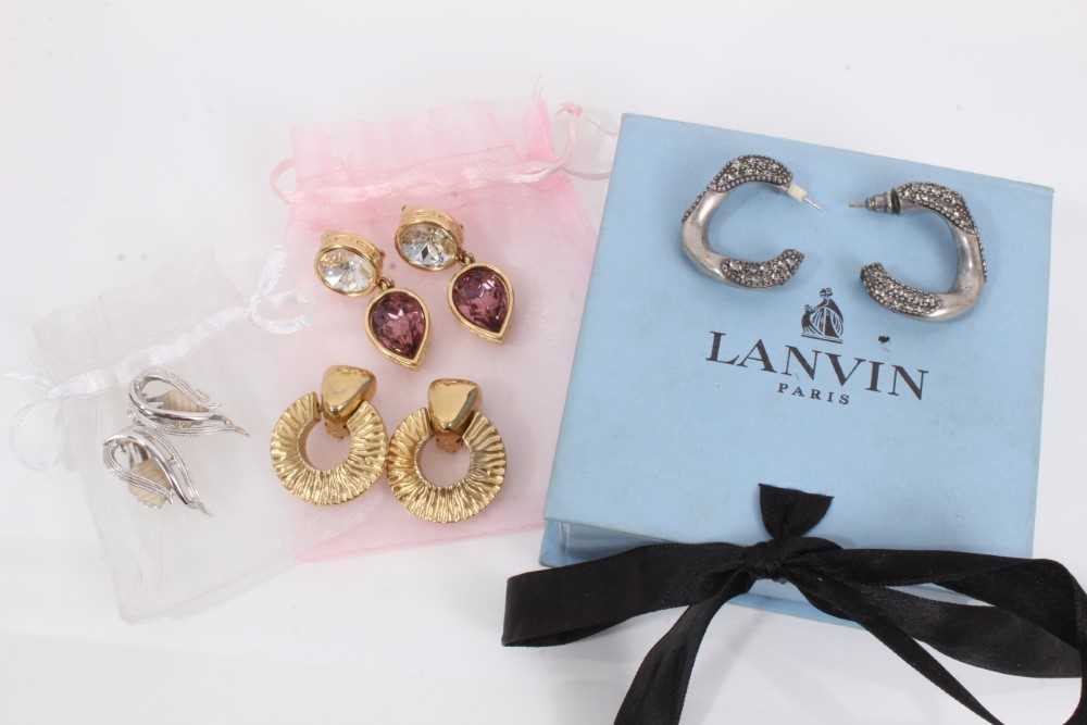 Lot 802 - Two pairs of 1980s Givenchy gilt metal clip on earrings, pair of Sarah Coventry clip on earrings and pair of Lanvin gem set half hoop earrings in box