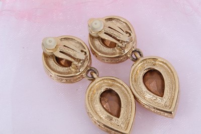 Lot 802 - Two pairs of 1980s Givenchy gilt metal clip on earrings, pair of Sarah Coventry clip on earrings and pair of Lanvin gem set half hoop earrings in box