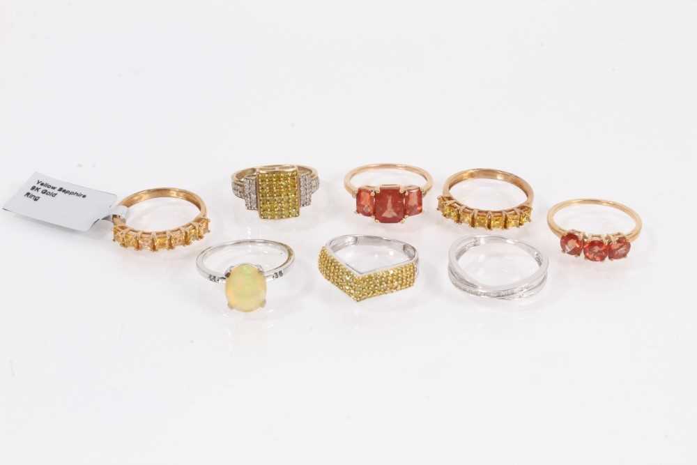 Lot 809 - Eight 9ct white and yellow gold gem set dress rings
