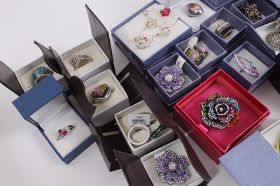 Lot 824 - Group of contemporary gem and paste set costume rings including a Butler & Wilson flower ring in box and other costume jewellery