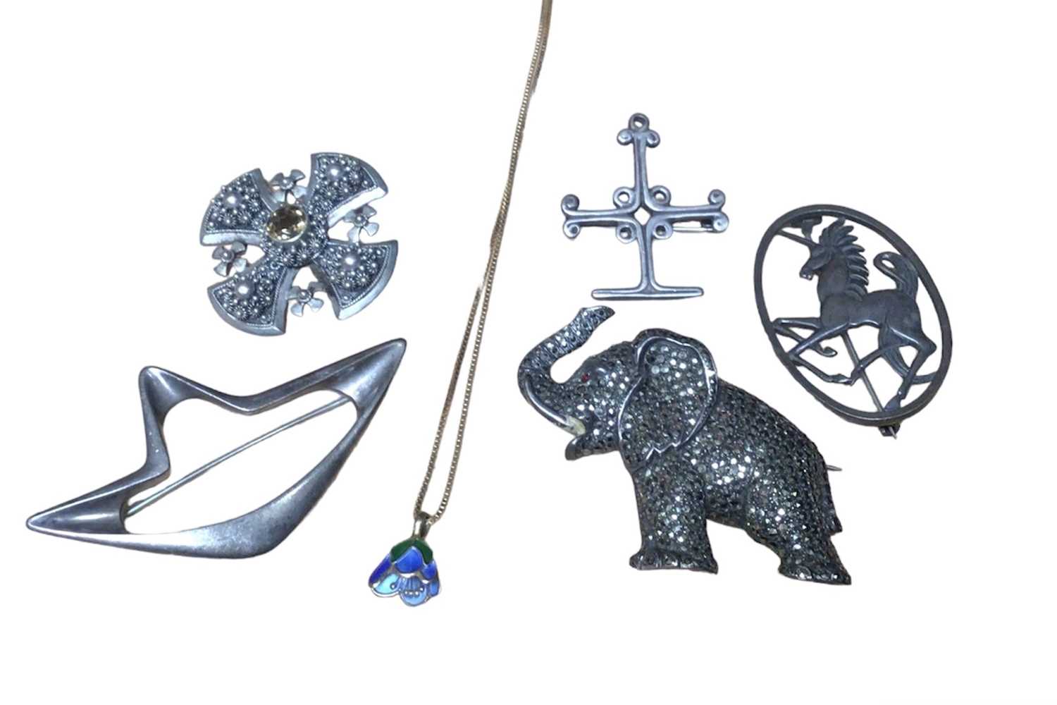 Lot 22 - Georg Jensen Danish silver abstract brooch, David Andersen Norwegian silver gilt and enamel harebell pendant, silver unicorn brooch etc