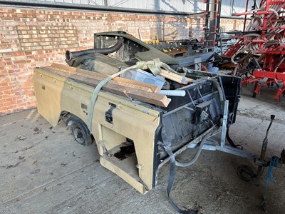 Lot 30 - Group of assorted Land Rover spares to include a roof, buck and front wing, believed to be from an ex. British Army 110, sold without reserve (Subject to 12% buyers premium inclusive of VAT).